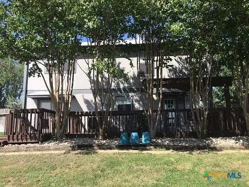 a view of a porch with a backyard
