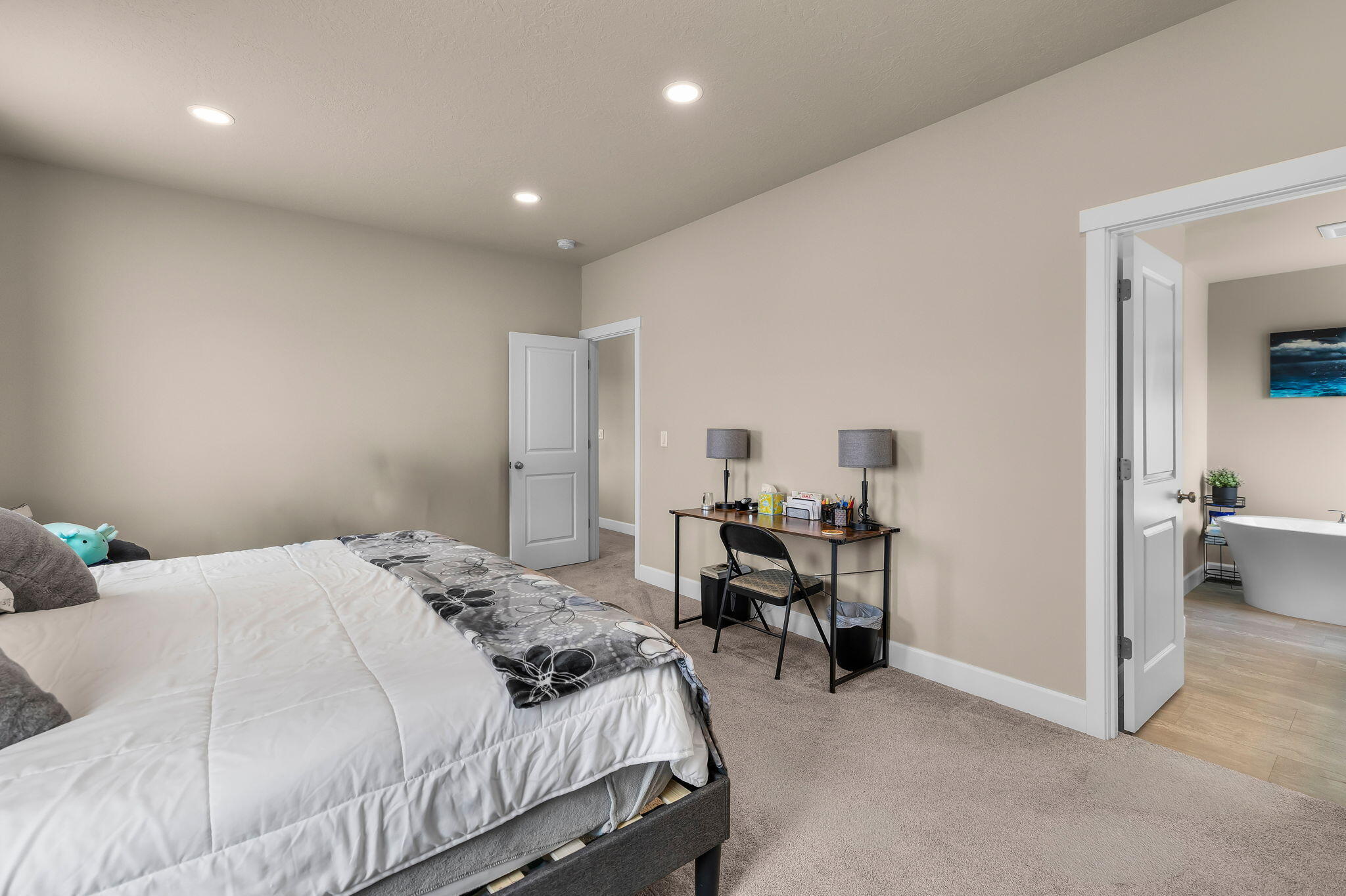 1132 Northwest Golf Course Drive Madras, OR 97741 - Photo 14 of 36 a bedroom with a bed and a desk