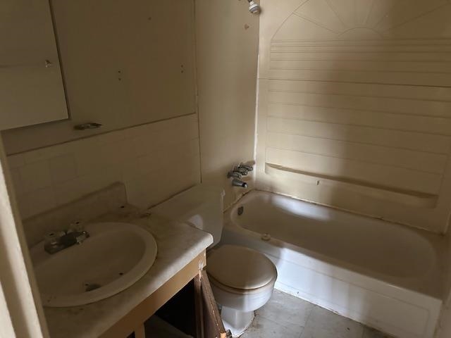 675 Miles, Unit 675 Memphis, TN 38111 - Photo 3 of 9 a bathroom with a sink and a toilet
