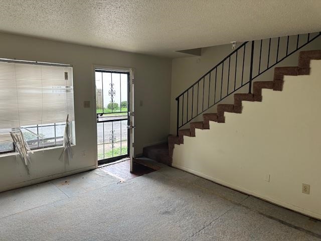 675 Miles, Unit 675 Memphis, TN 38111 - Photo 6 of 9 a view of an empty room with stairs and a window