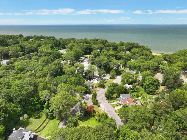a view of a lake with a houses