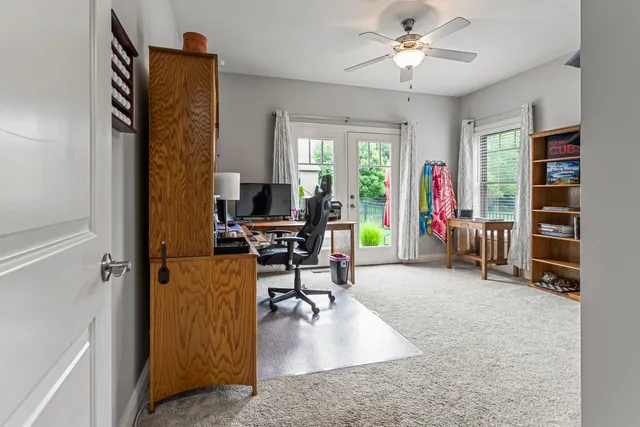 a workspace with furniture and a window