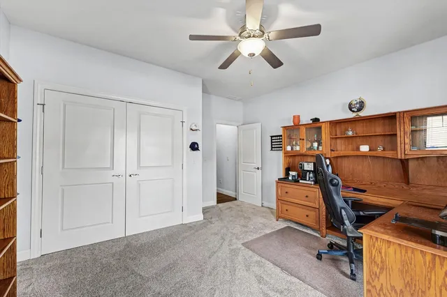 a view of a workspace with furniture