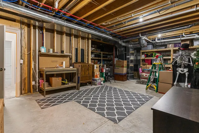 a front view of house with yard and outdoor seating