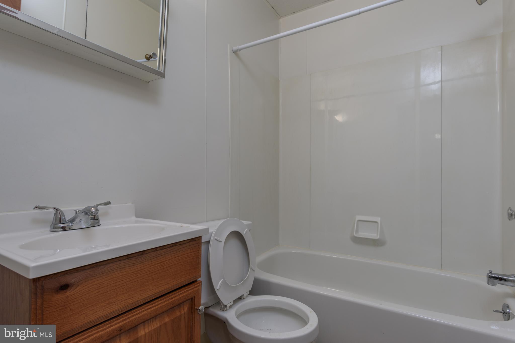 155 North Hanover Street Carlisle, PA 17013 - Photo 12 of 16 a bathroom with a sink toilet and bathtub