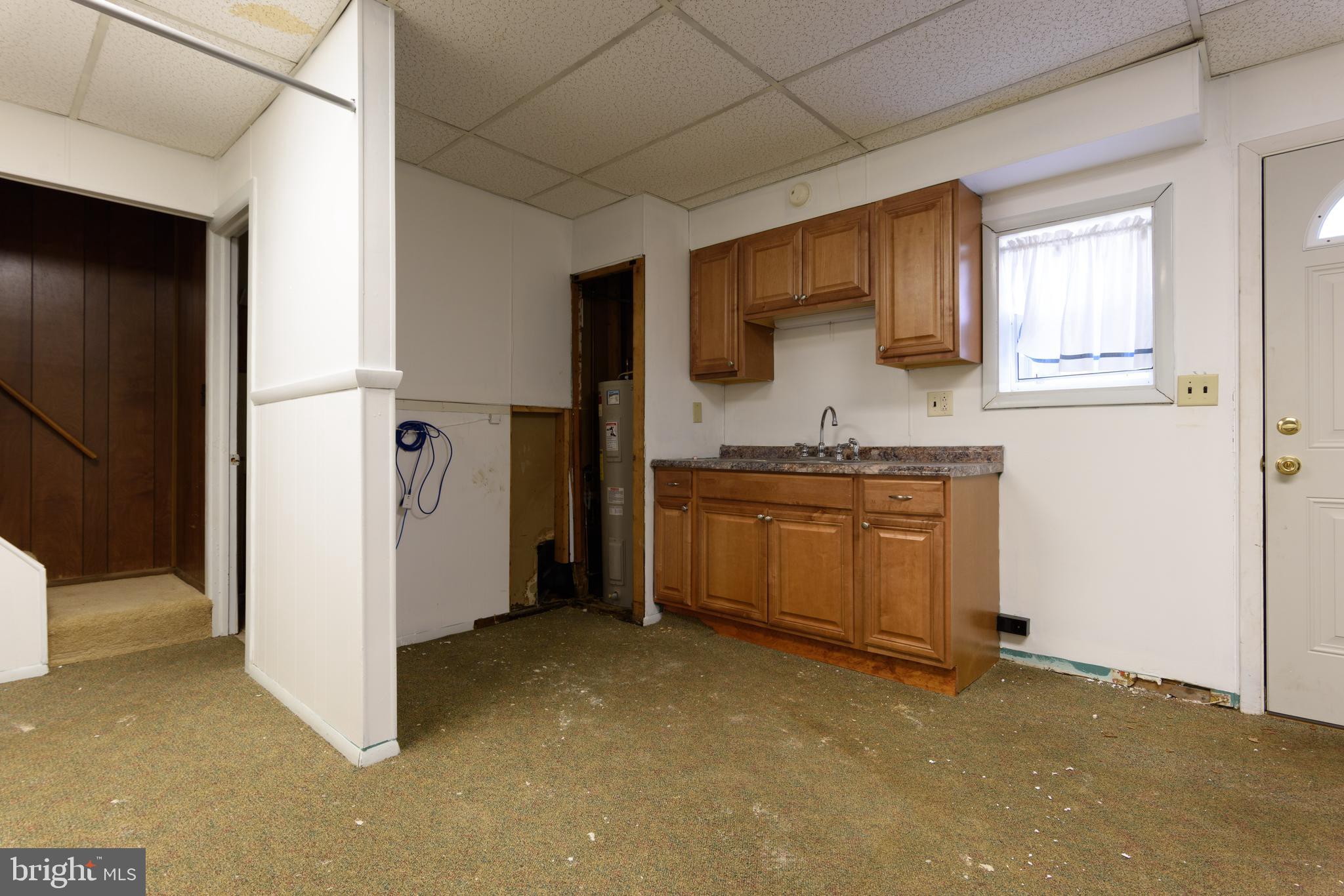 155 North Hanover Street Carlisle, PA 17013 - Photo 10 of 16 a kitchen with stainless steel appliances granite countertop a stove a sink and a refrigerator
