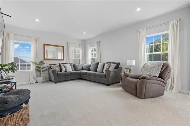 a living room with furniture and a couch