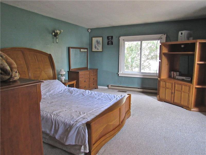 106 Pearce Road Mars, PA 16046 - Photo 16 of 20 Master Bedroom a large room with closet and a 2nd floor balcony.