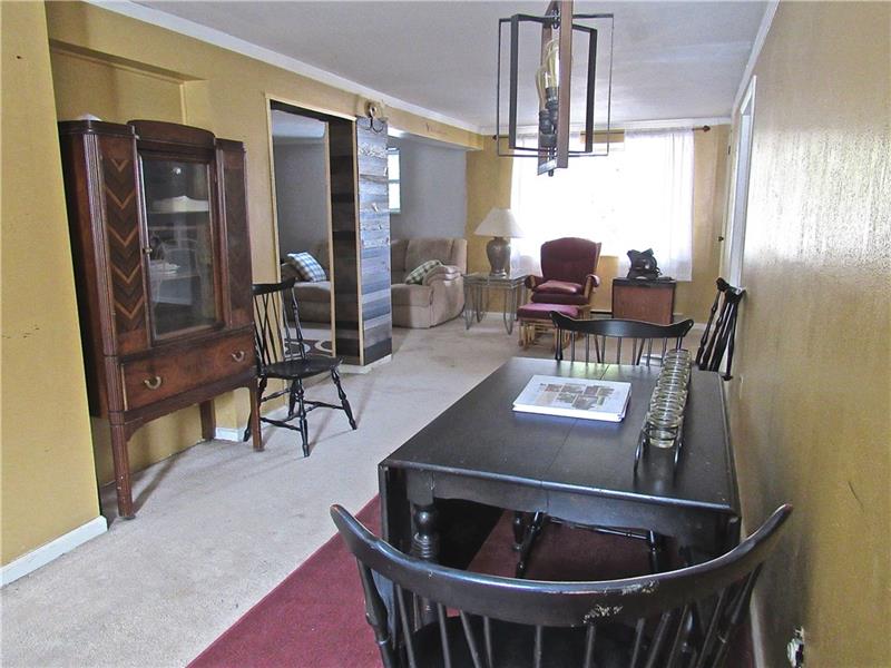 106 Pearce Road Mars, PA 16046 - Photo 9 of 20 Dining room opens to living/family room.
