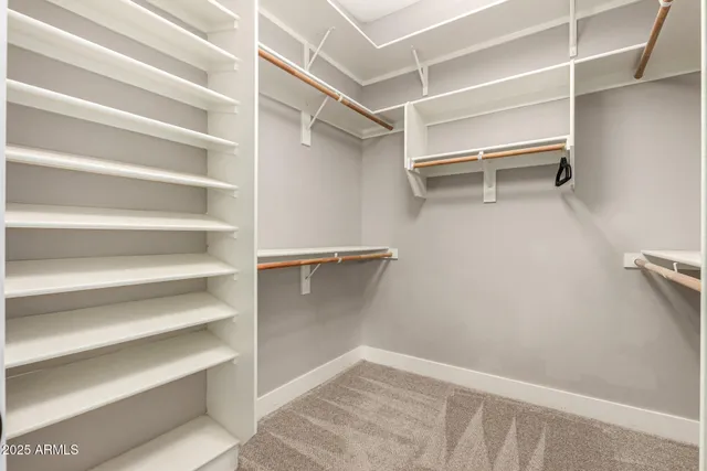 a white bath tub sitting next to a white toilet