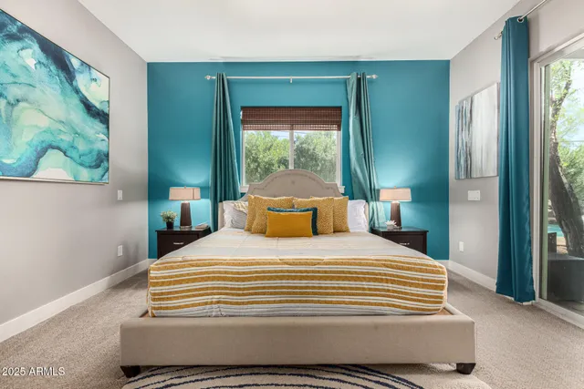 a bathroom with a granite countertop sink mirror and a shower