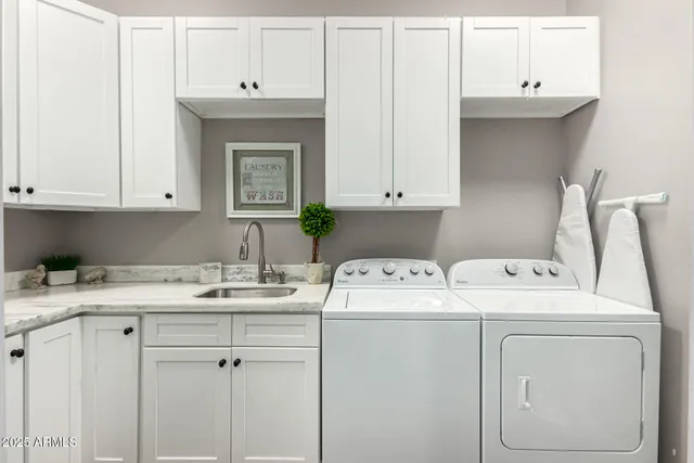 a view of a swimming pool with a yard