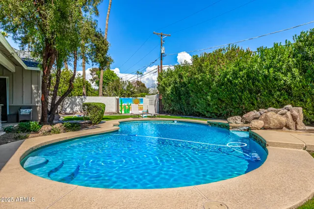 a view of yard with patio