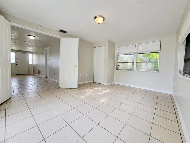 a view of a room and window