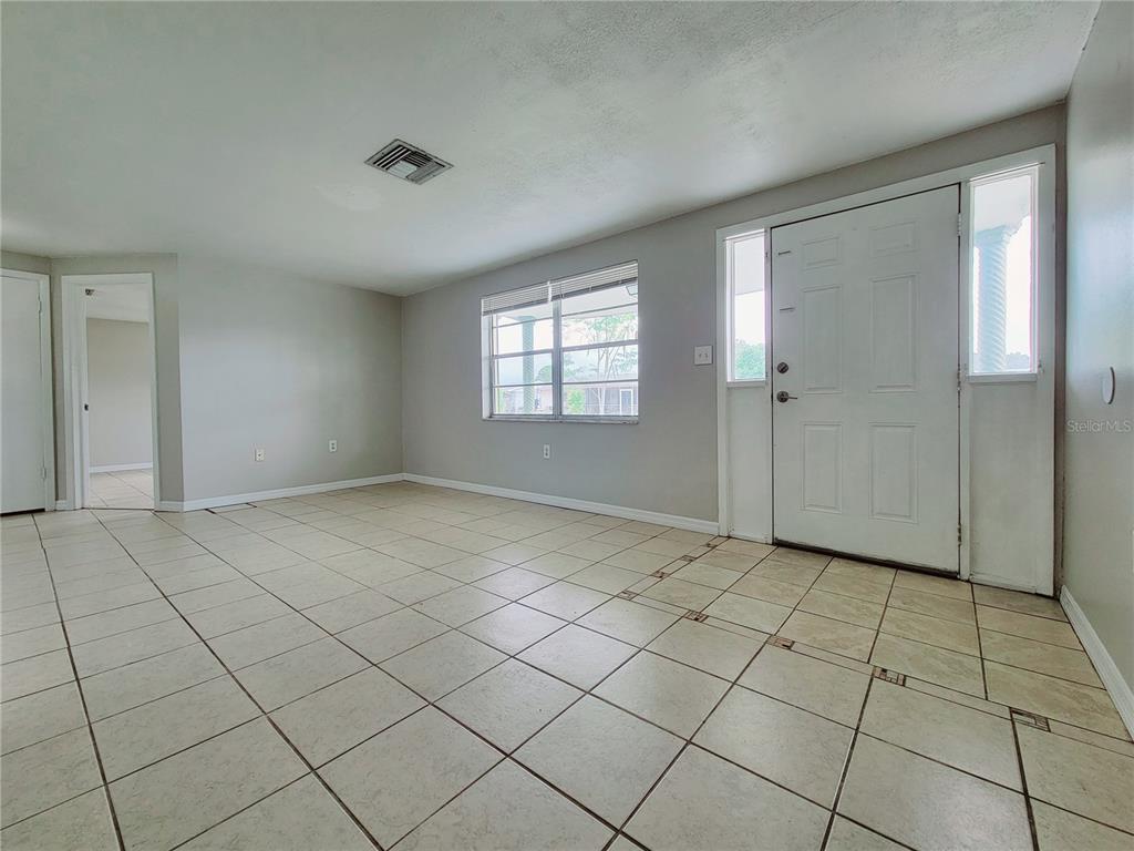 7341 Mayfield Drive Port Richey, FL 34668 - Photo 20 of 20 a view of an empty room and window