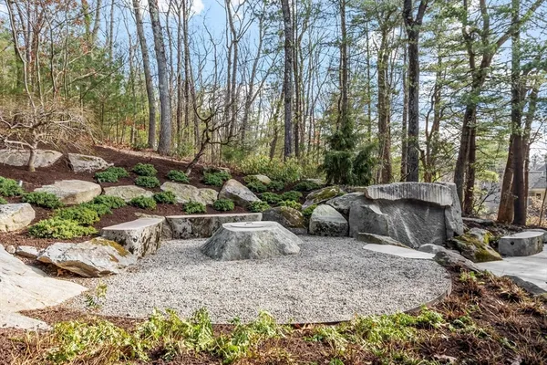 a view of a couches and a fire pit