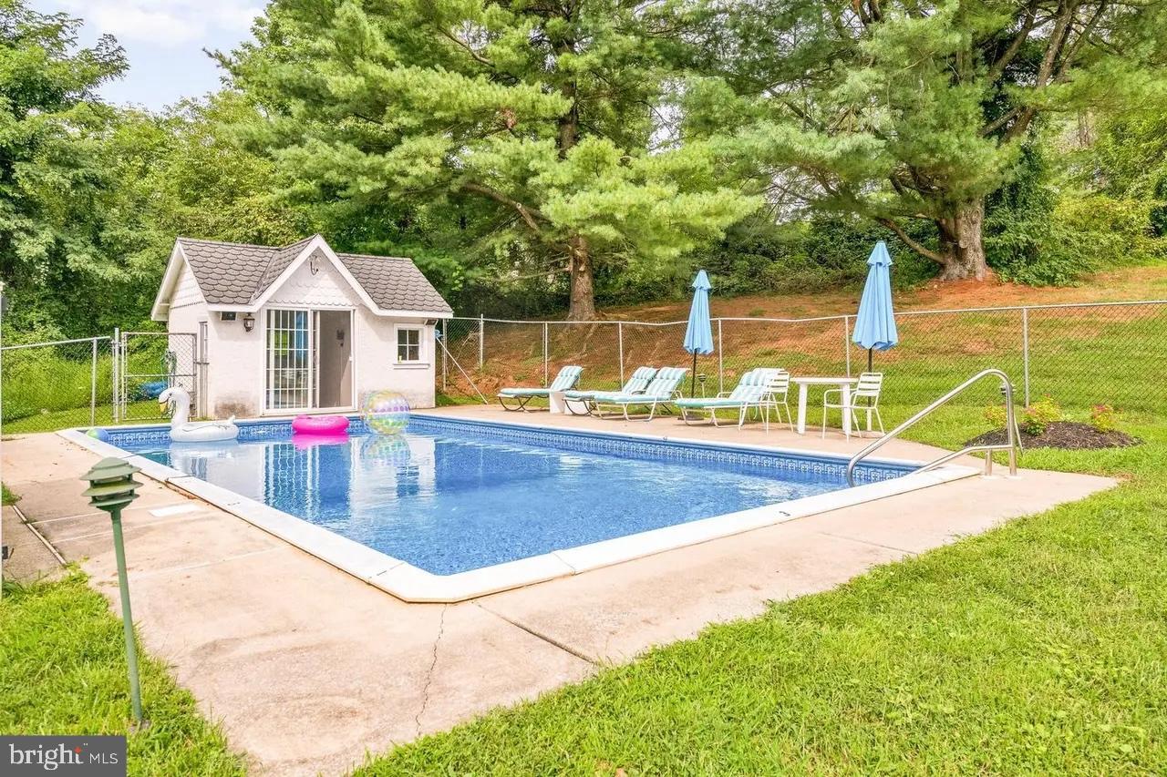 908 Lincoln Road Phoenixville, PA 19460 - Photo 4 of 26 Charming poolside retreat with cozy shed.