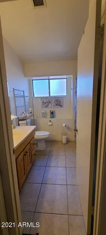 a kitchen with a sink a stove and a refrigerator