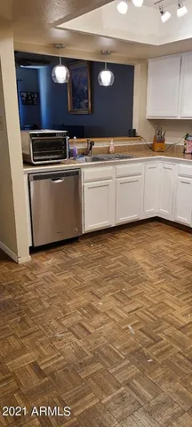 a view of a sink and an oven