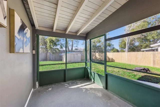 a view of an outdoor space with a large window