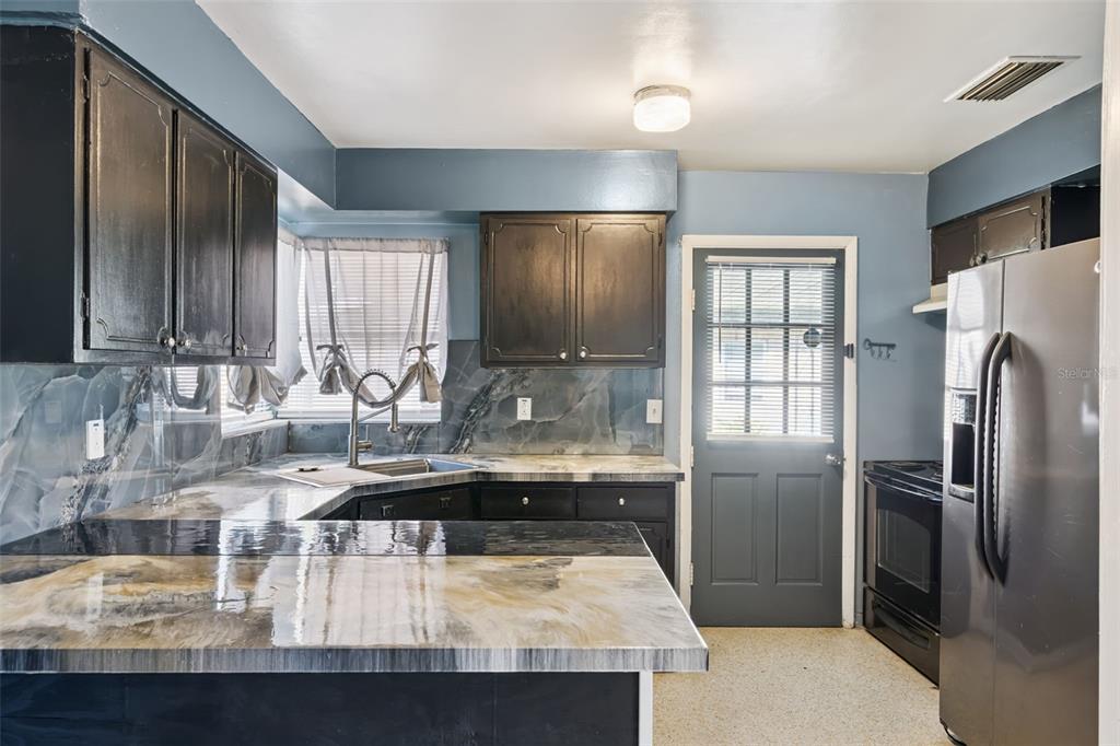 962 Saxon Boulevard Deltona, FL 32725 - Photo 7 of 37