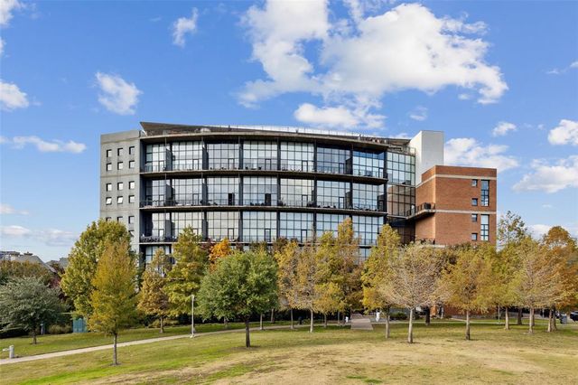 a front view of a house with a swimming pool