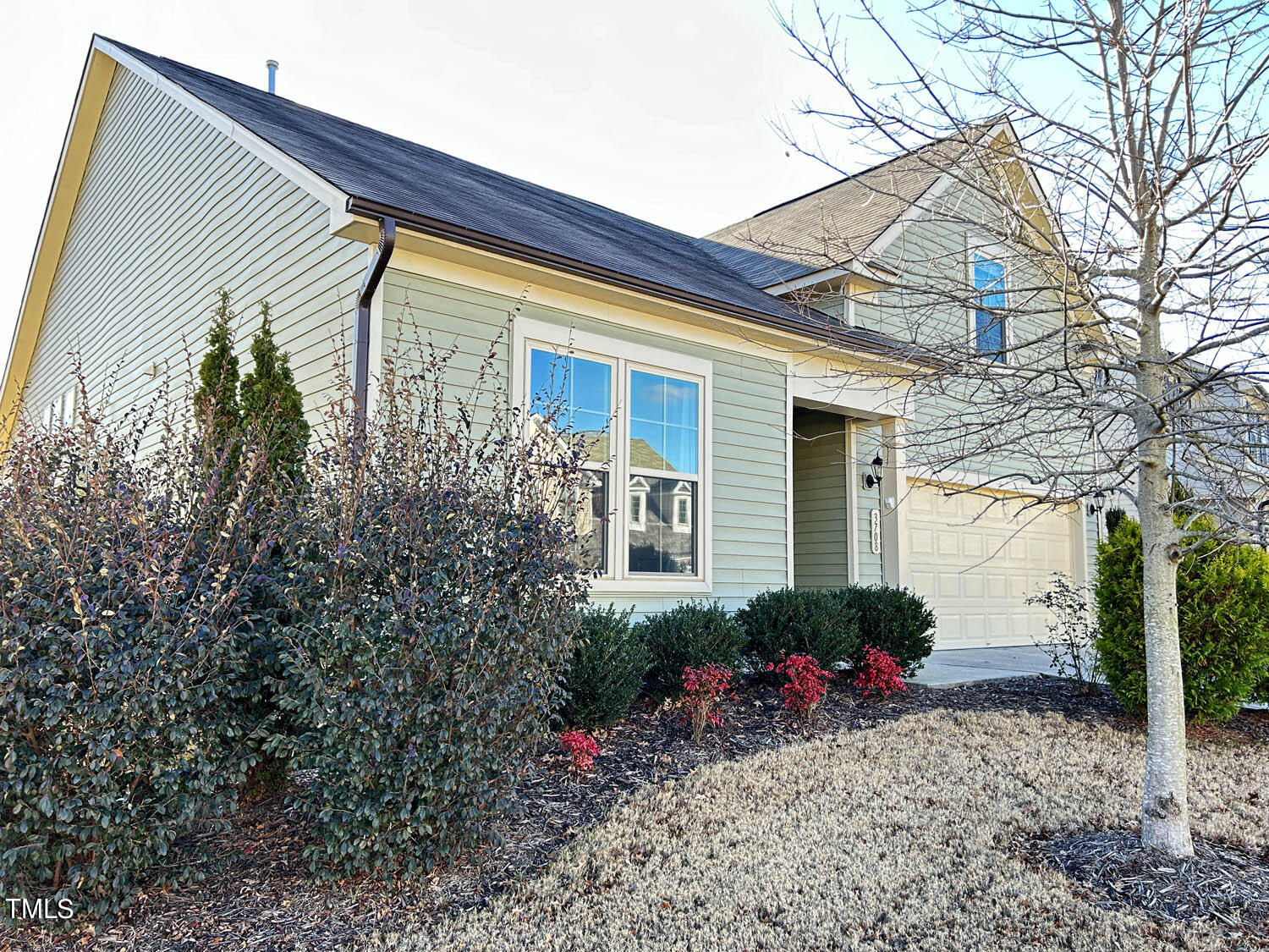 3708 Pilot Cove Way Wake Forest, NC 27587 - Photo 3 of 4 a view of a house with potted plants