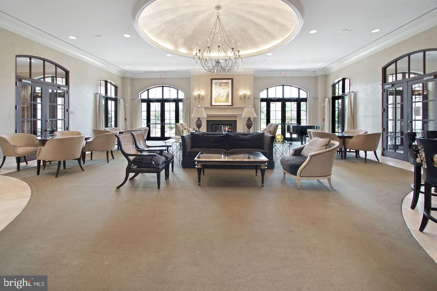 11710 Old Georgetown Road, Unit 1206 North Bethesda, MD 20852 - Photo 15 of 19 a living room with furniture and a chandelier