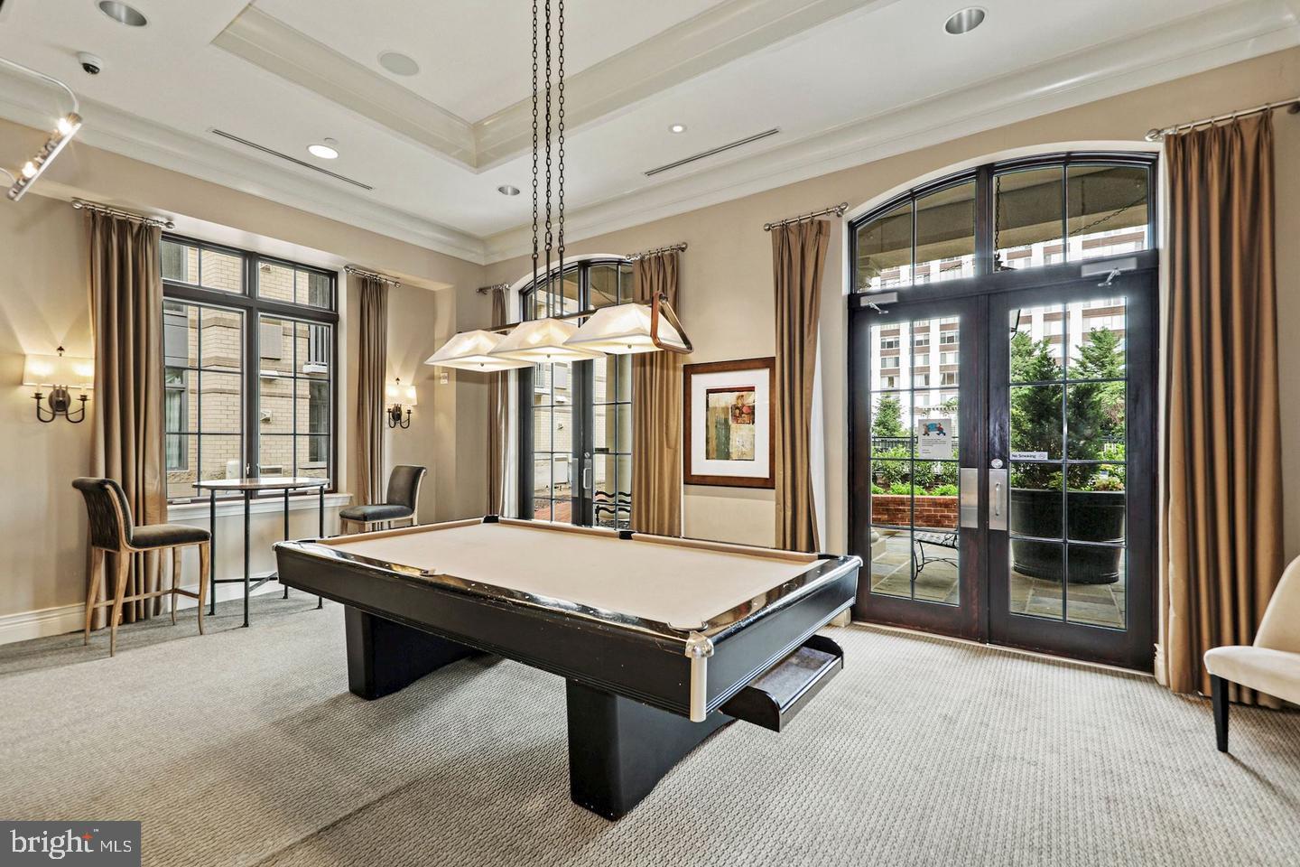 11710 Old Georgetown Road, Unit 1206 North Bethesda, MD 20852 - Photo 16 of 19 a room with pool table and windows