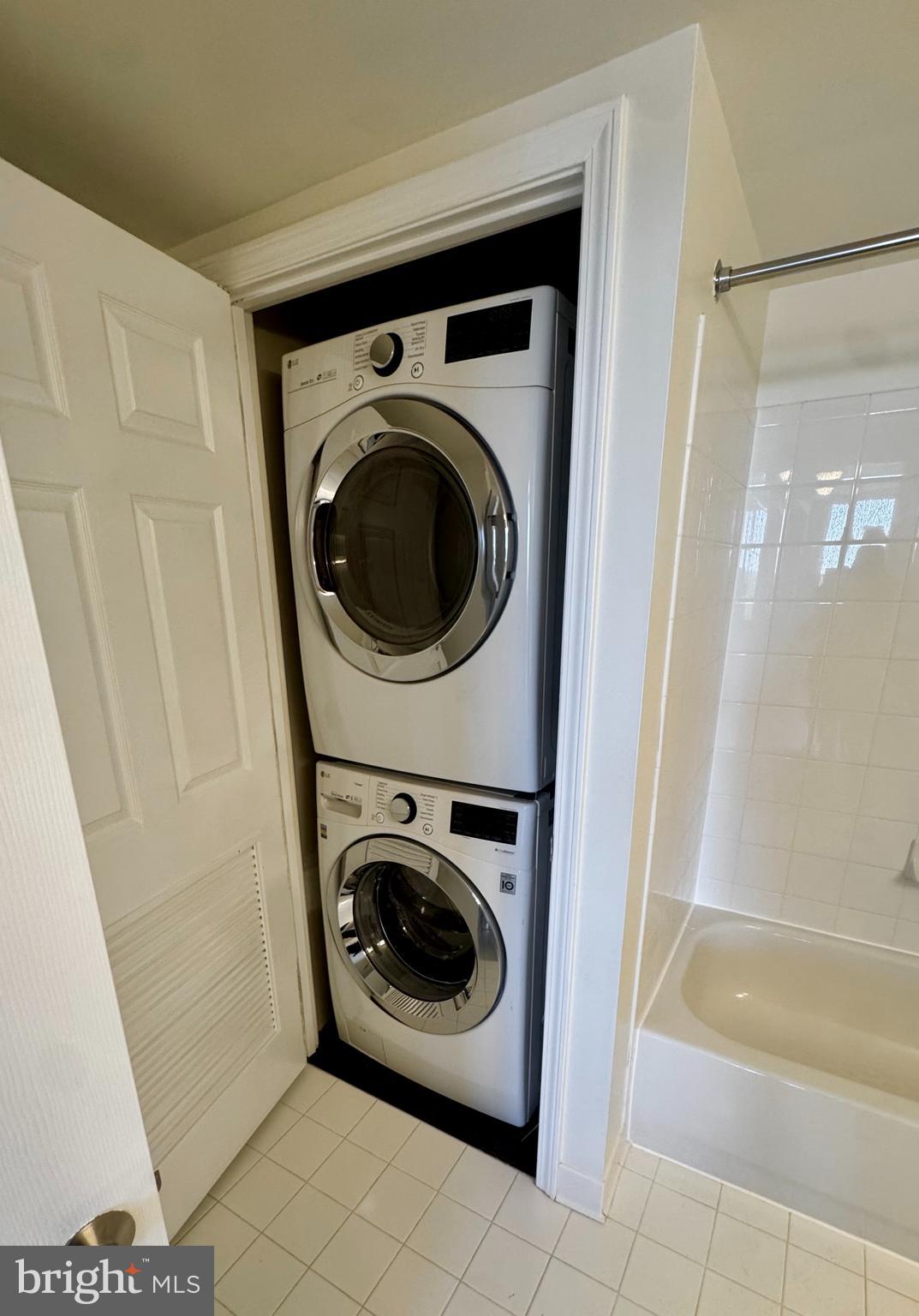 11710 Old Georgetown Road, Unit 1206 North Bethesda, MD 20852 - Photo 9 of 19 a utility room with dryer and washer