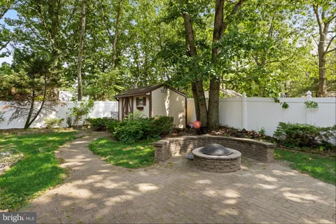 a house view with a backyard space