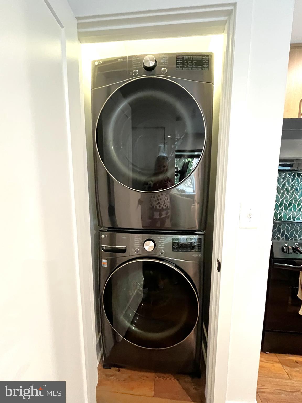 2020 Biglane Court, Unit A Huntingtown, MD 20639 - Photo 11 of 29 a utility room with dryer and washer