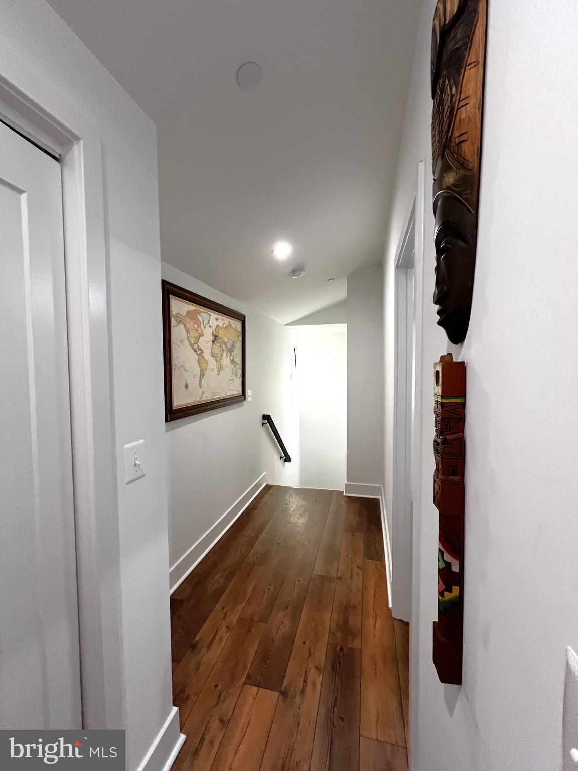 2020 Biglane Court, Unit A Huntingtown, MD 20639 - Photo 25 of 29 an entryway of a house with wooden floor