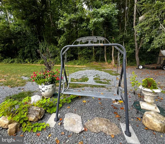 a view of a garden with patio