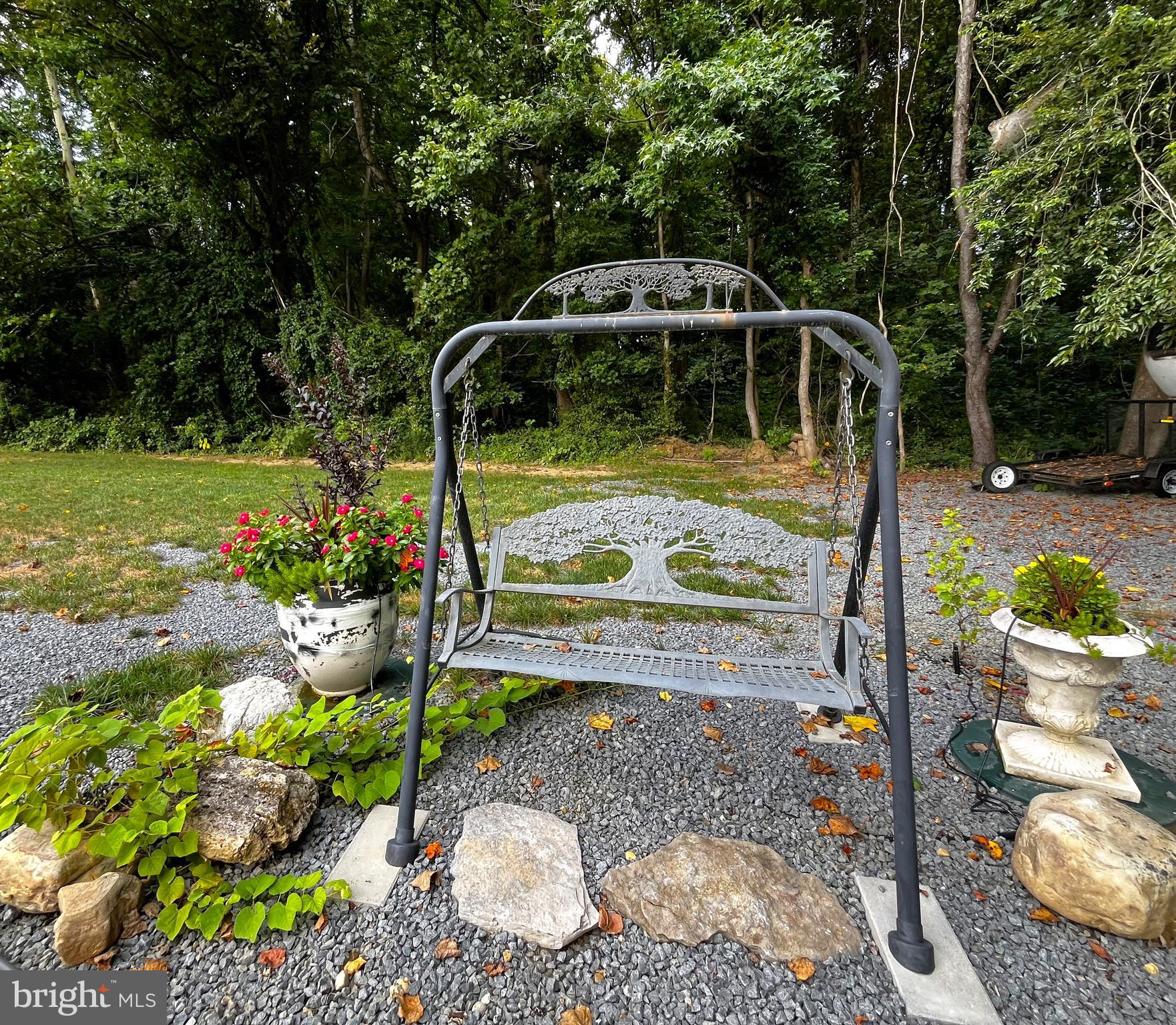 2020 Biglane Court, Unit A Huntingtown, MD 20639 - Photo 26 of 29 a view of a garden with patio