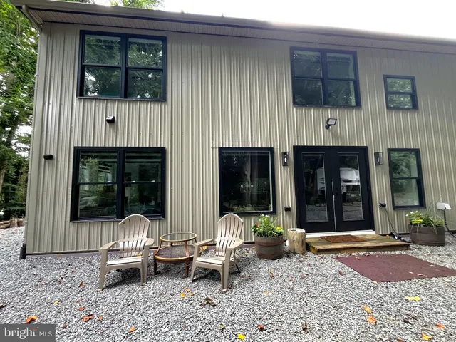 a front view of a house with porch