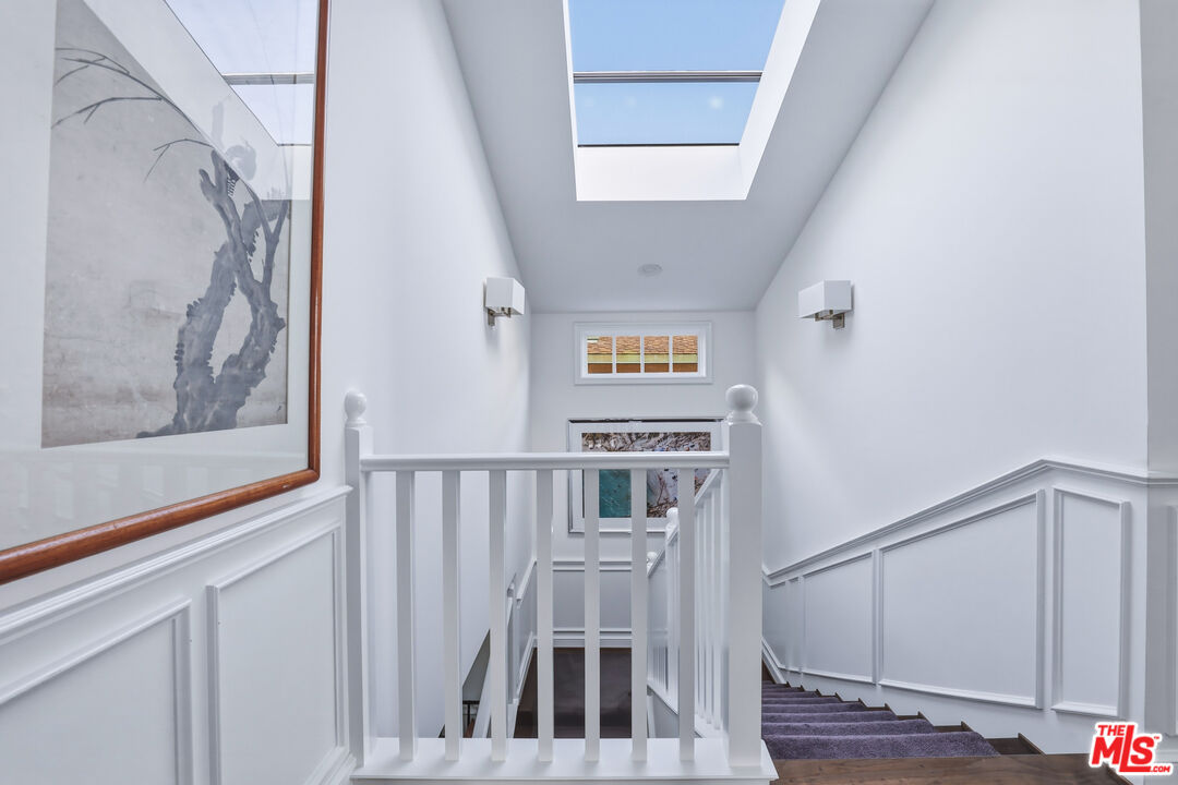 30810 Broad Beach Road Malibu, CA 90265 - Photo 29 of 55 a view of staircase with railing and white walls