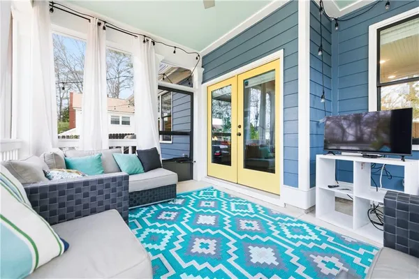 a bathroom with a granite countertop double vanity sink and a mirror
