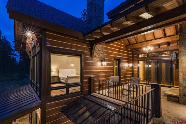 a patio with table and chairs