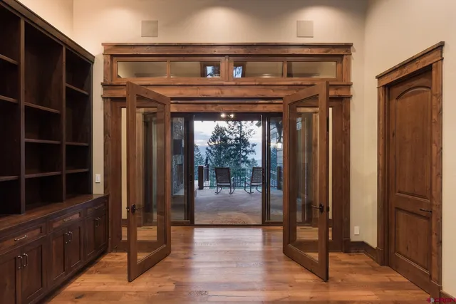 a bedroom with a bed and a fireplace