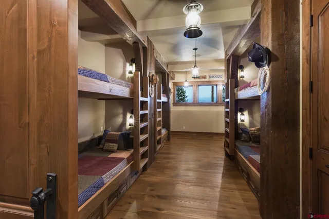 a bathroom with a shower and a glass door