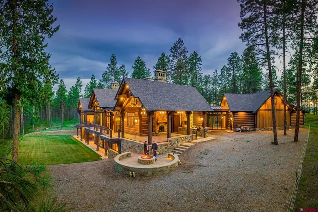 an outdoor space with furniture and garden
