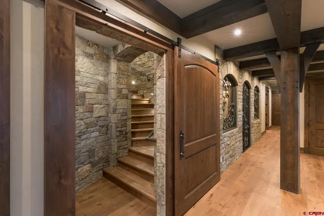 a view of a porch with a wooden door