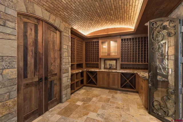 a lobby with furniture and flat screen tv