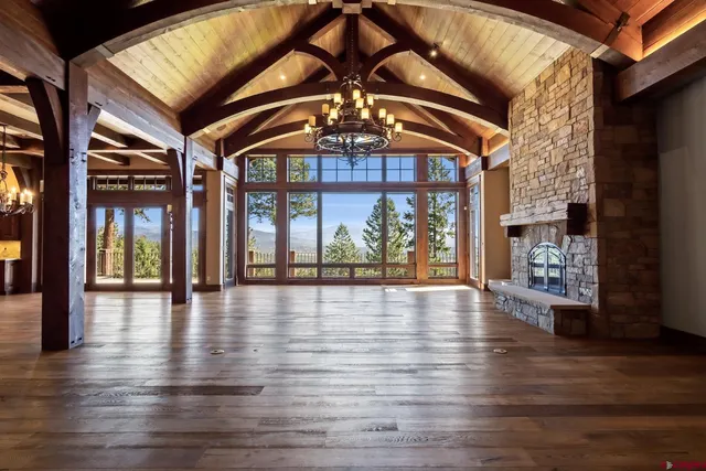 a view of an entryway with wooden floors