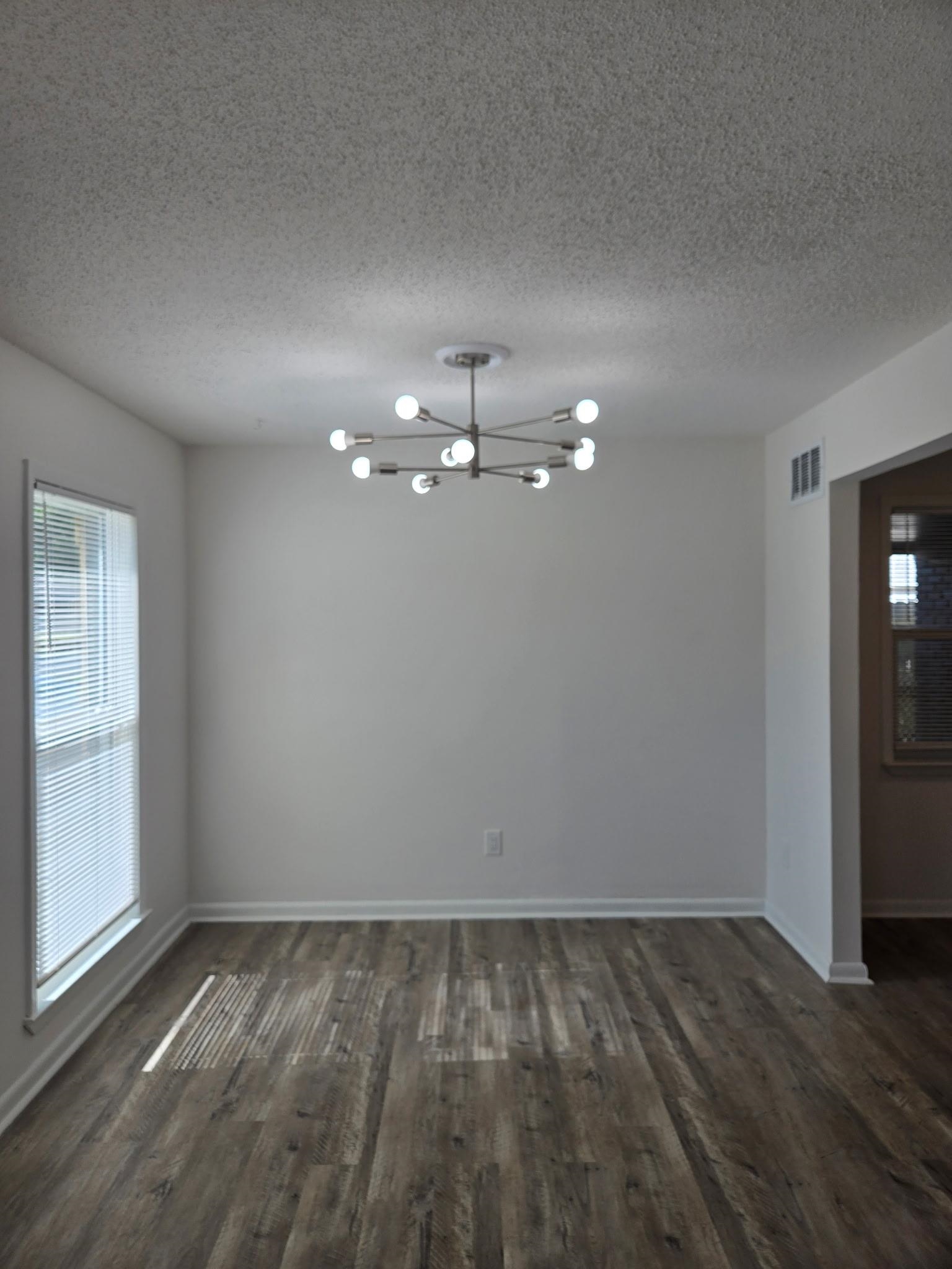 2889 Randy Cove Memphis, TN 38118 - Photo 7 of 18 Modern sputnik chandelier illuminating wood-finish flooring