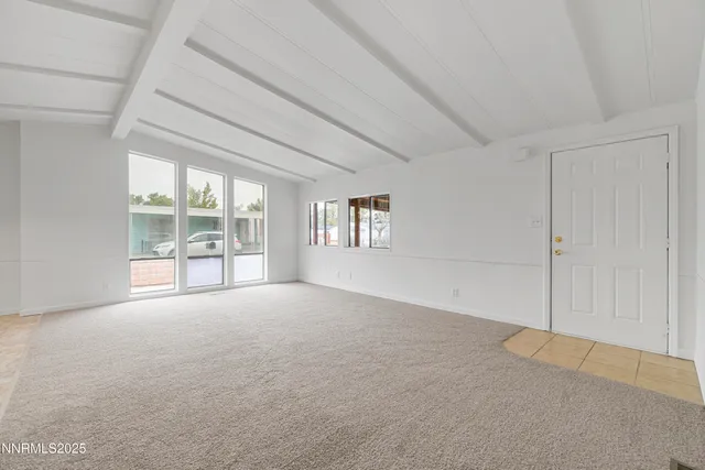a kitchen with a sink and a stove top oven