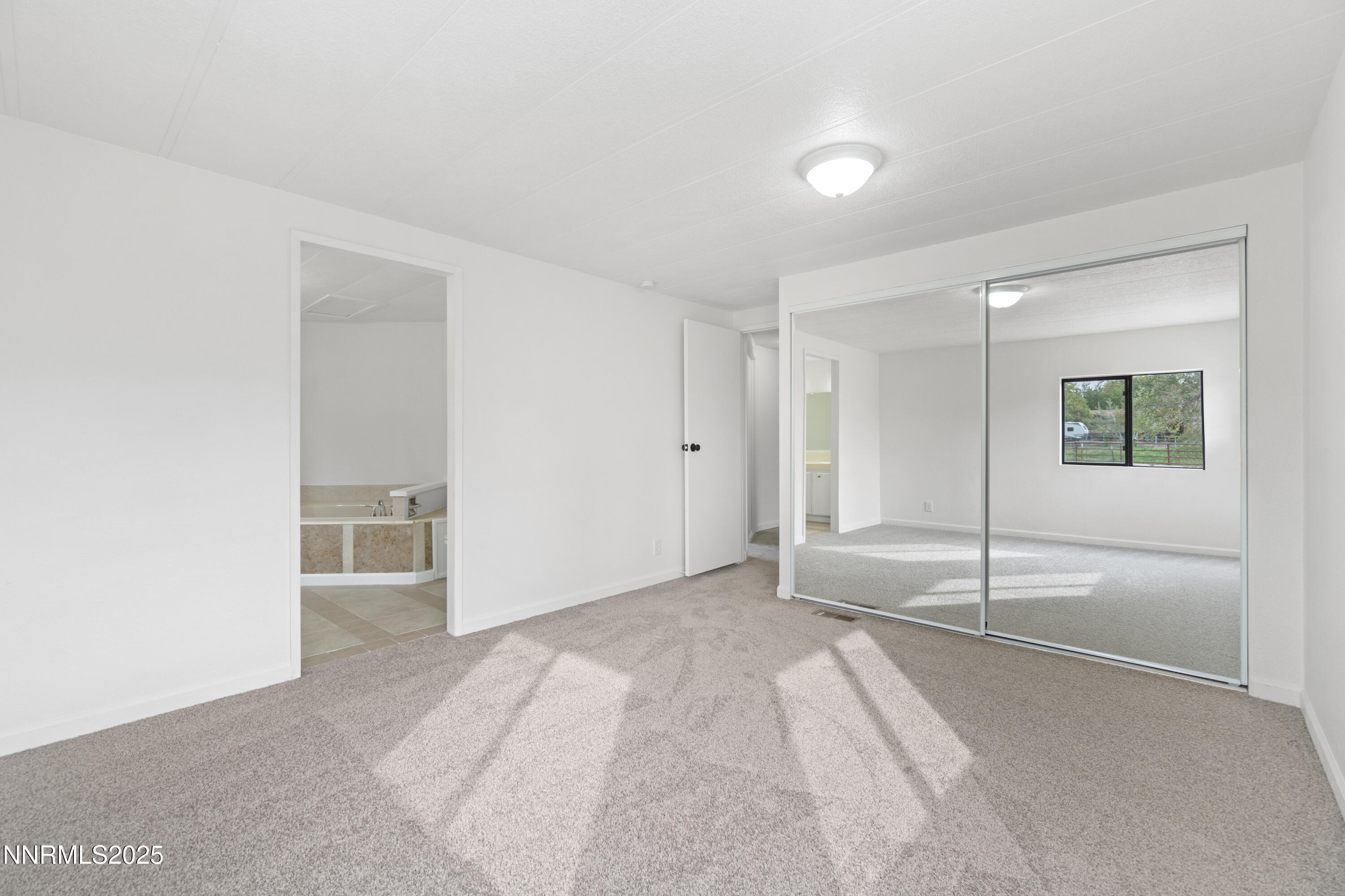 1025 Villa Way Fernley, NV 89408 - Photo 24 of 26 a view of an empty room with a window