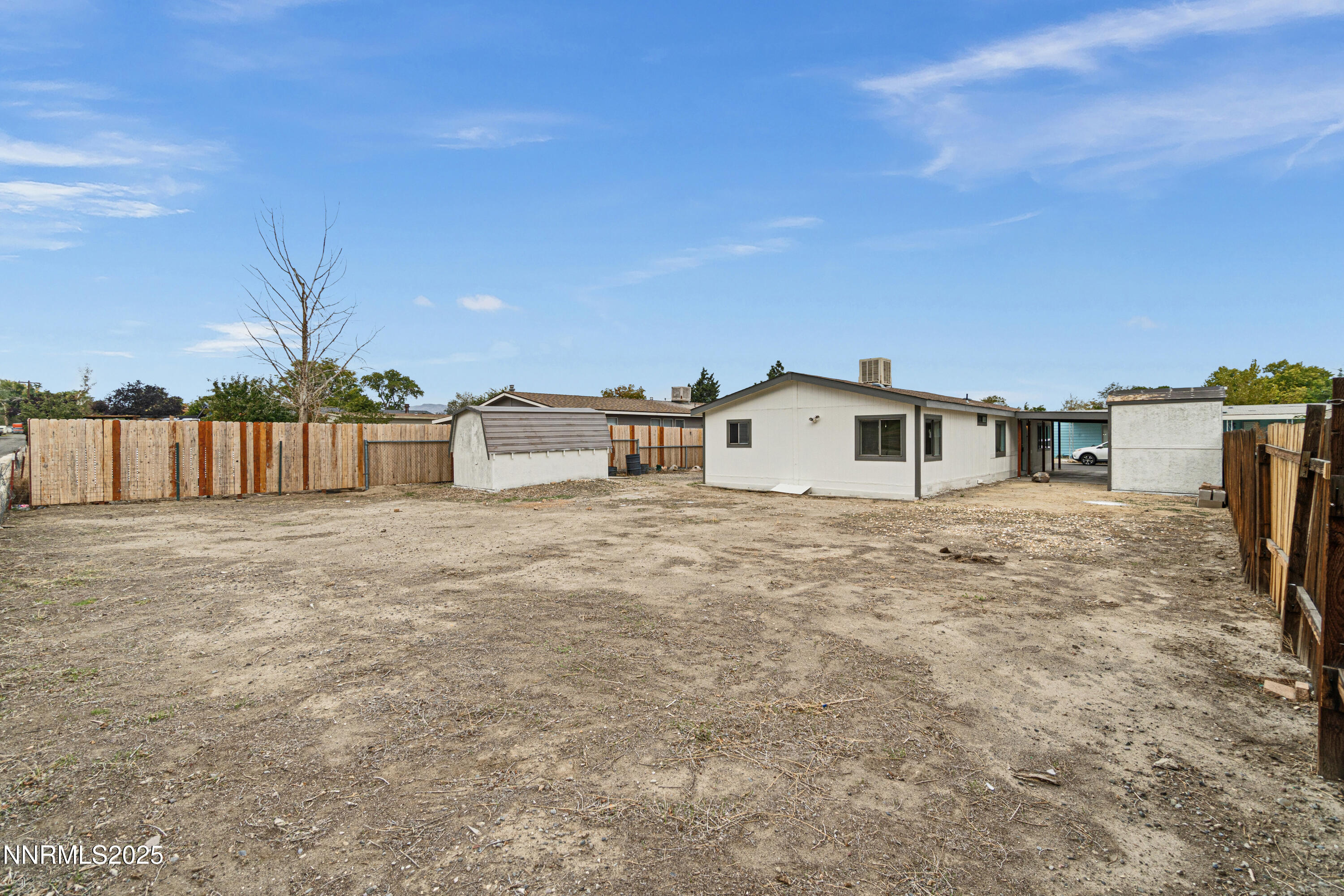 1025 Villa Way Fernley, NV 89408 - Photo 5 of 26 a house view with a backyard space