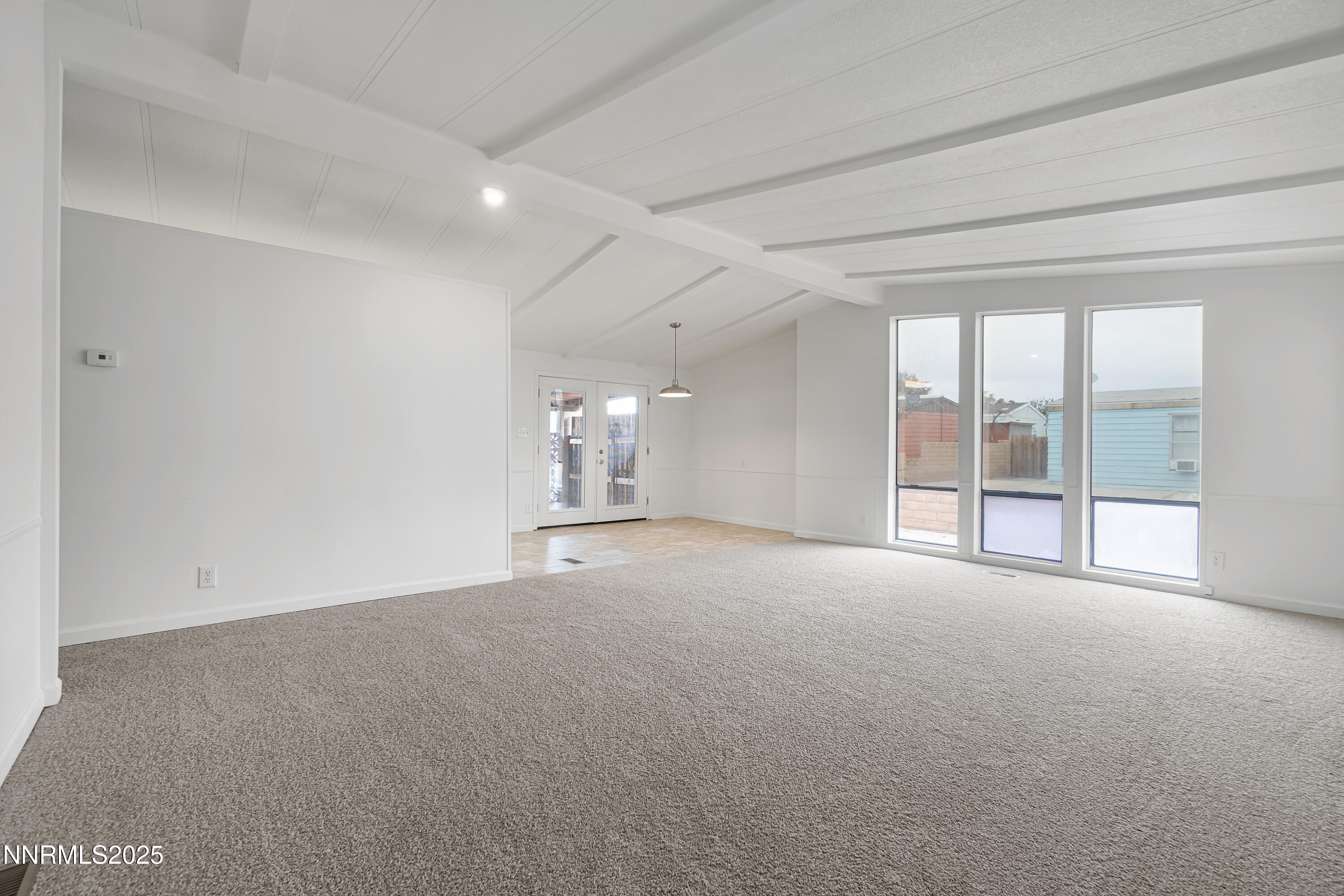 1025 Villa Way Fernley, NV 89408 - Photo 10 of 26 a view of an empty room with a window
